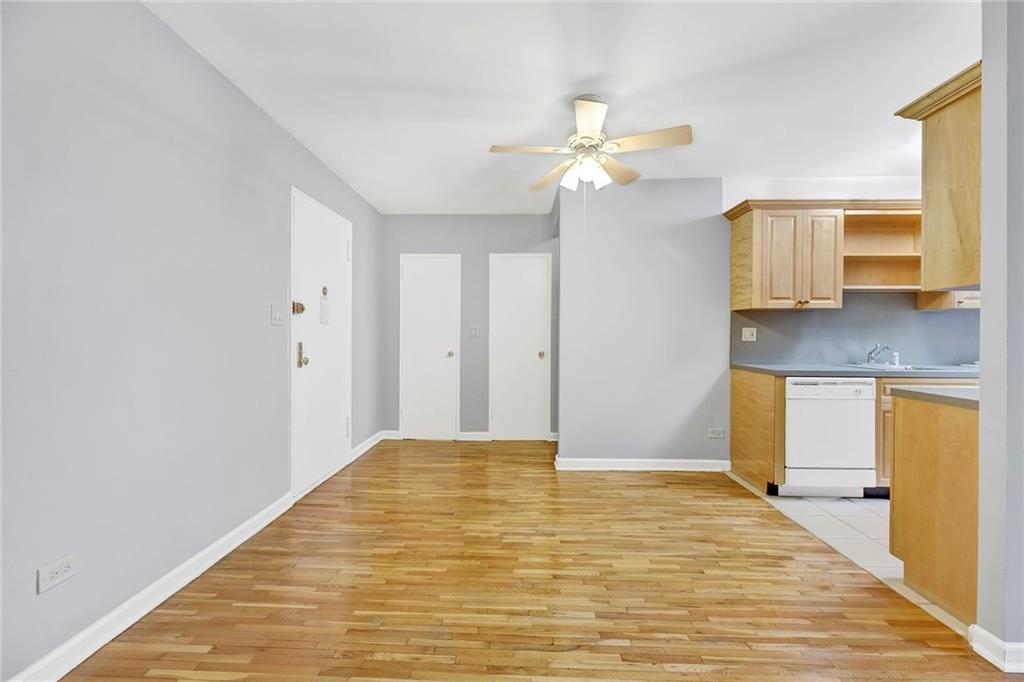9411 Shore Road, Unit 1I Brooklyn, NY 11209 - Photo 5 of 13 a view of a livingroom with wooden floor