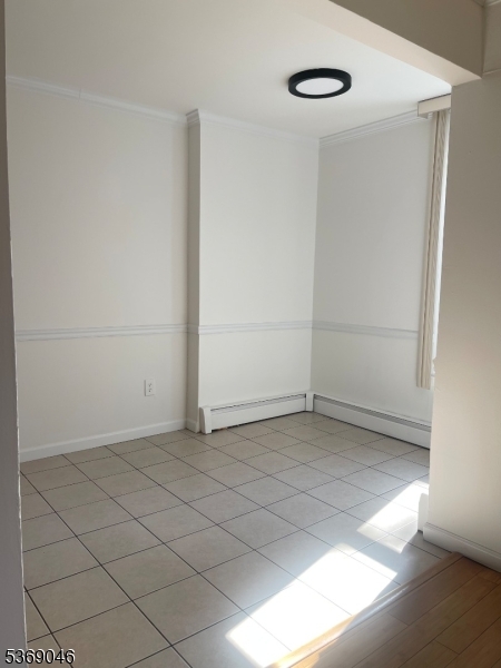 21 River Road, Unit G Nutley, NJ 07110 - Photo 10 of 22 an empty room with an empty space