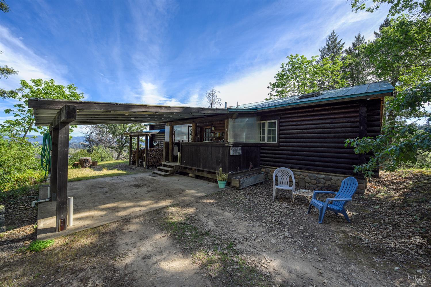 12300 Skaggs Springs Road Geyserville, CA 95441 - Photo 14 of 68 a view of a house with backyard