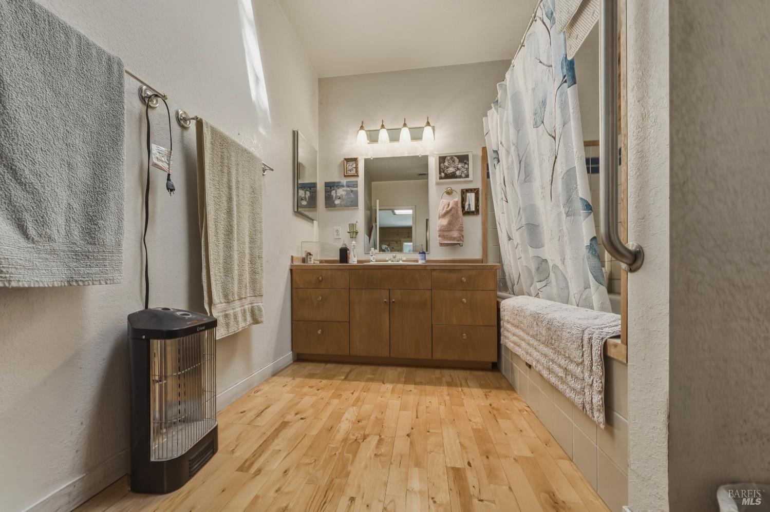12300 Skaggs Springs Road Geyserville, CA 95441 - Photo 34 of 68 a bathroom with a tub sink and mirror