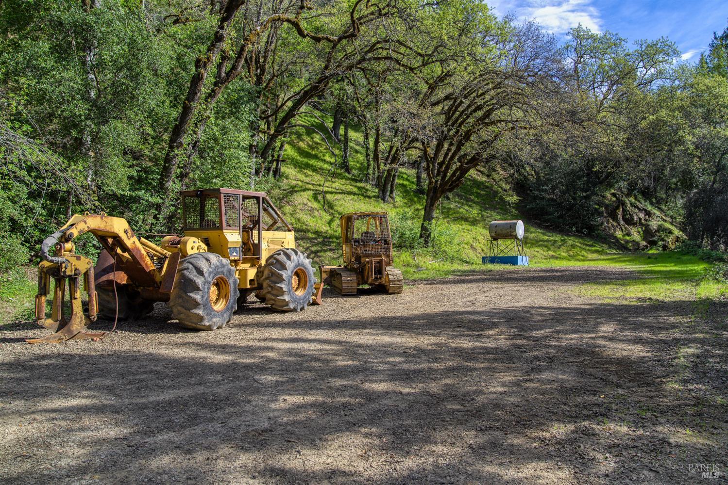 12300 Skaggs Springs Road Geyserville, CA 95441 - Photo 8 of 68 Landing at confluence just past second gate. Equipment is neighbor's who does an excellent job on the roads and cleaning up down trees.