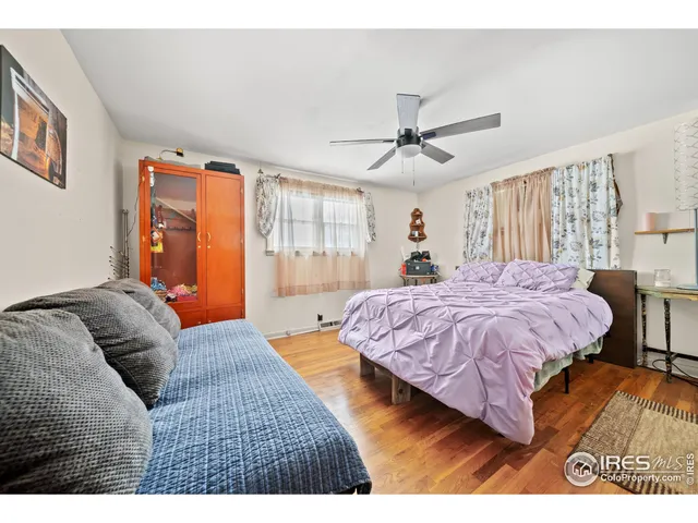 a bathroom with a sink toilet and mirror
