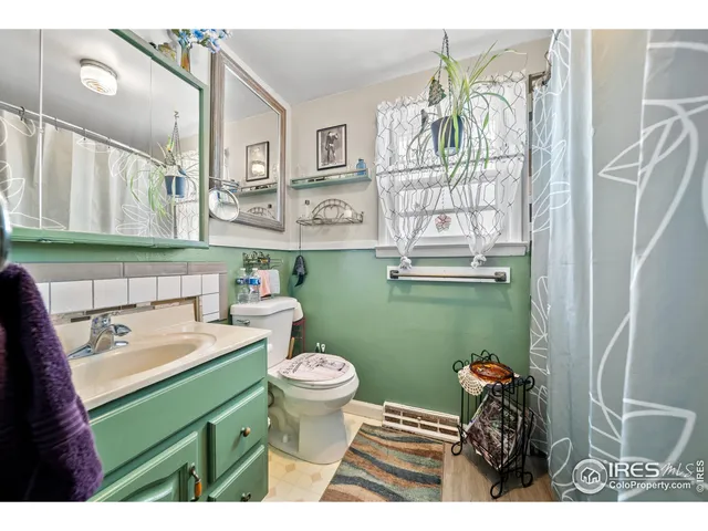 a bedroom with a bed and a table