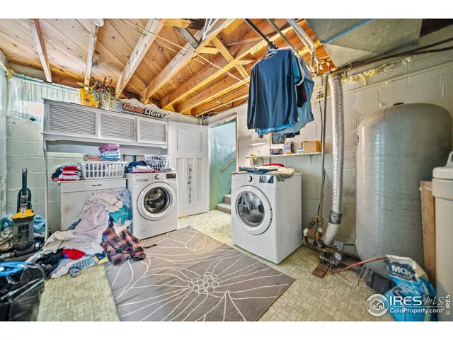 a view of a garage with the red door