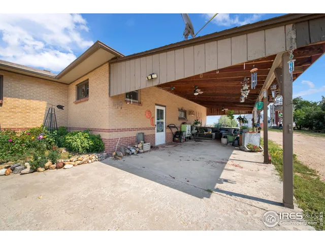 a view of a house with entertaining space