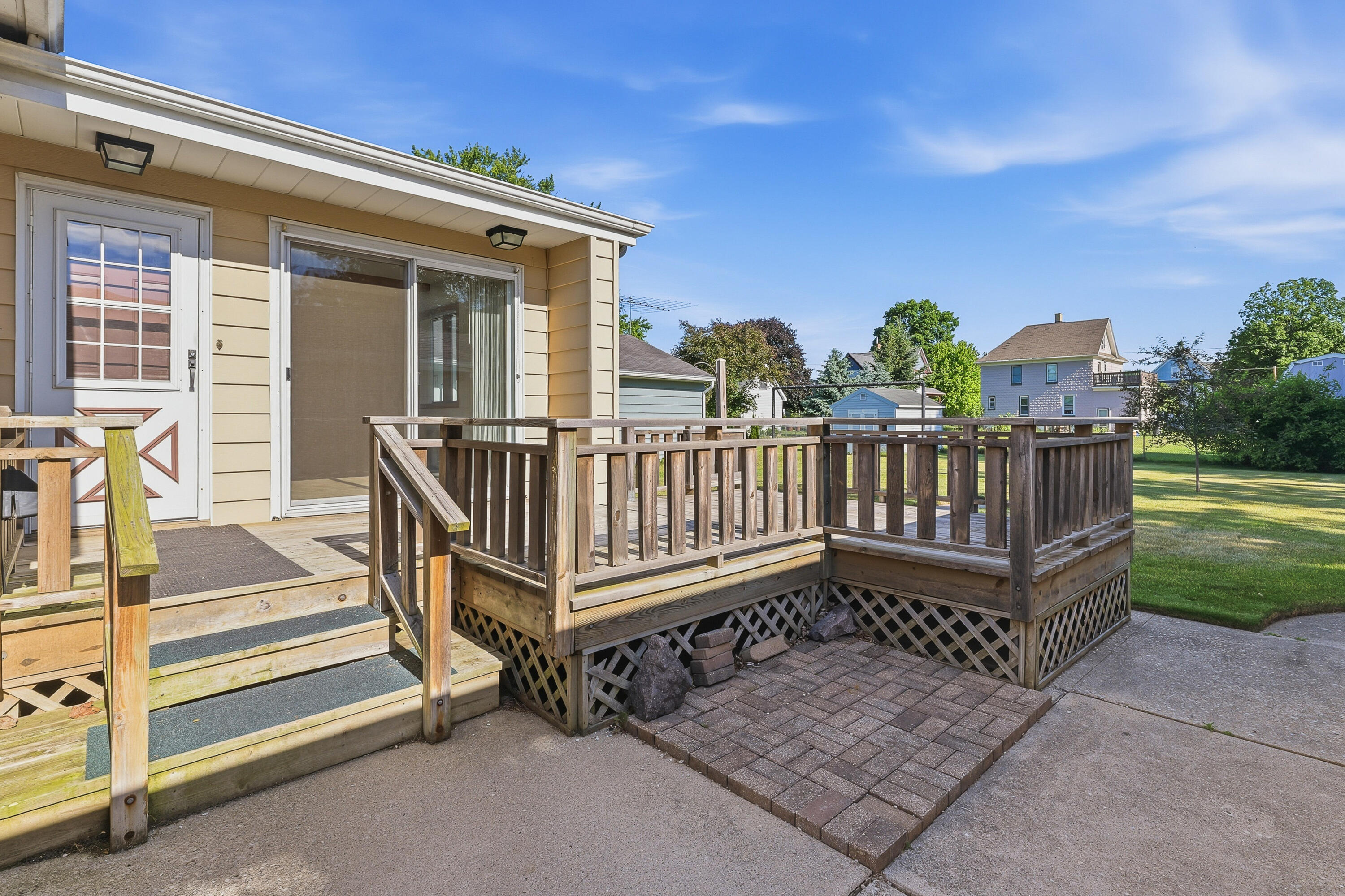 643 Grand Avenue Random Lake, WI 53075 - Photo 9 of 36 Backyard Deck
