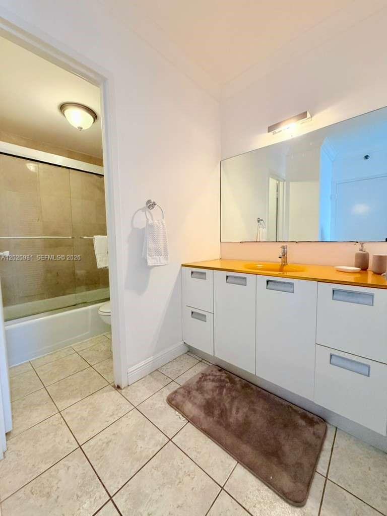 100 Lincoln Road, Unit 1423 Miami Beach, FL 33139 - Photo 9 of 17 a view of a kitchen with an empty space and a sink