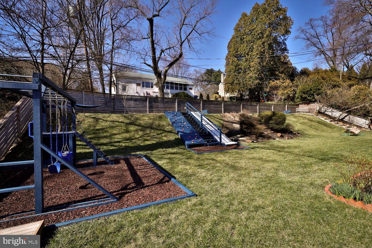 730 Wyndale Road Jenkintown, PA 19046 - Photo 24 of 53 Custom playset, hill slide, rock wall