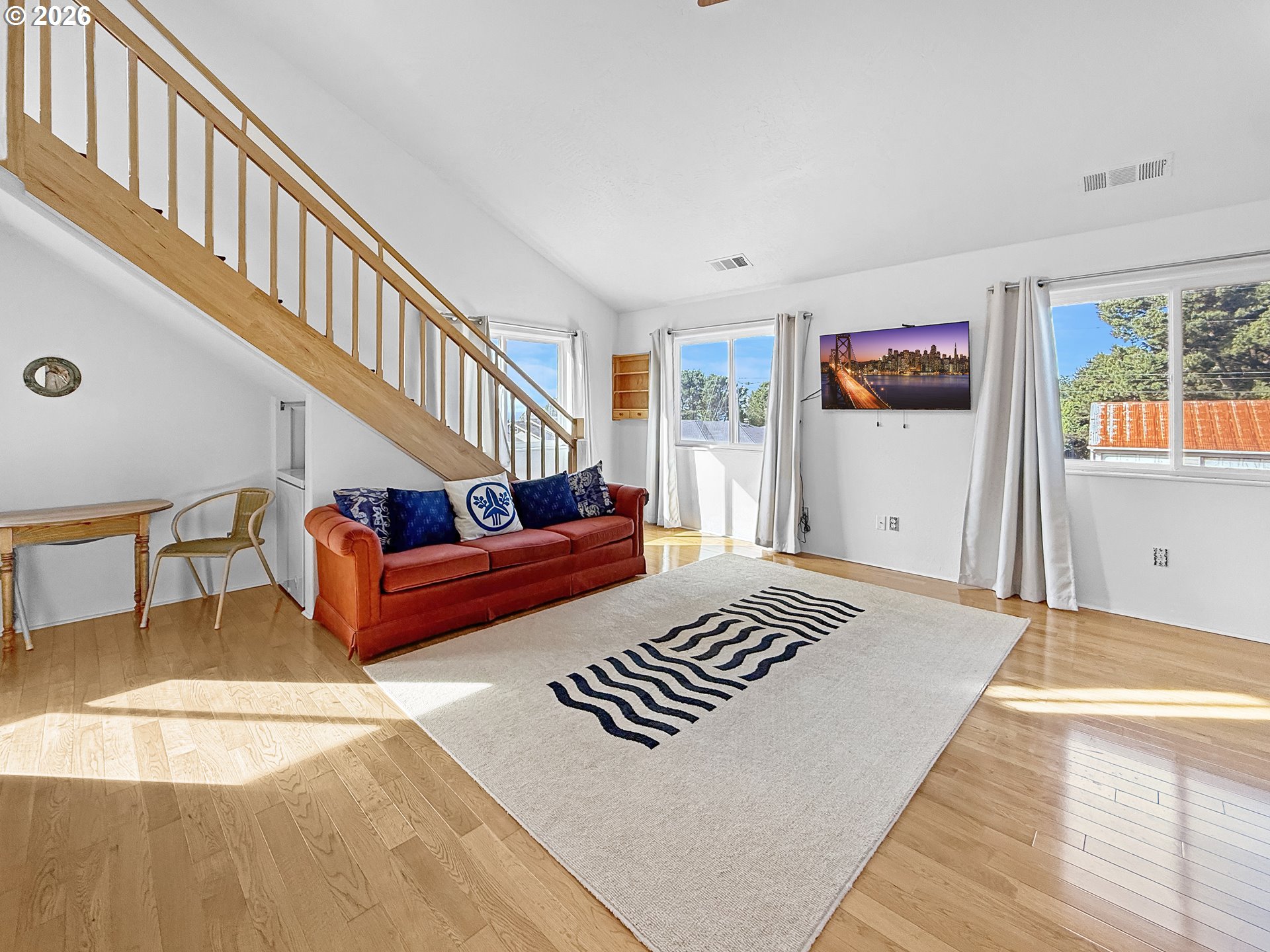 17197 Passley Road Brookings, OR 97415 - Photo 20 of 46 a bedroom with furniture and a rug