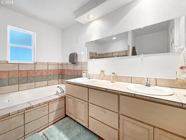 a bathroom with a sink and a bathtub