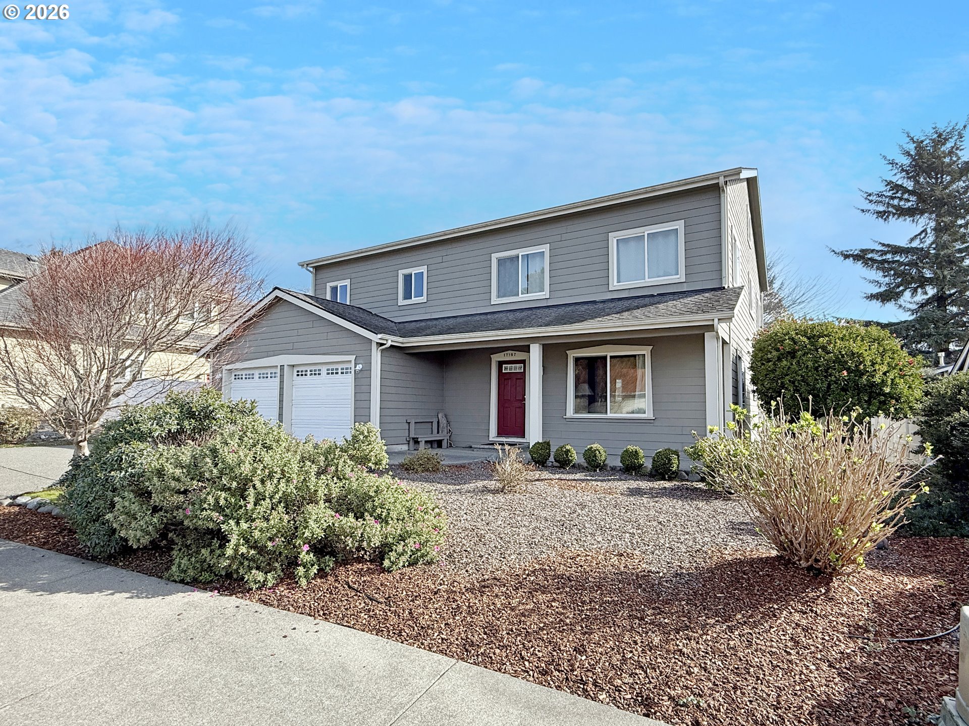 17197 Passley Road Brookings, OR 97415 - Photo 44 of 46 a front view of a house with garden