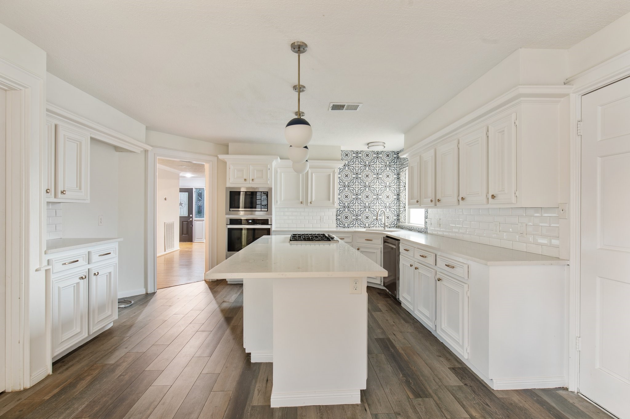 17902 Fernbluff Drive Spring, TX 77379 - Photo 15 of 38 a kitchen with cabinets a sink and appliances