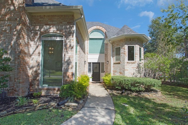 17902 Fernbluff Drive Spring, TX 77379 - Photo 36 of 38 a front view of a house with garden