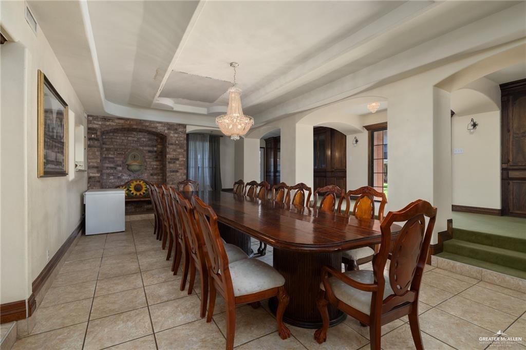 4523 South Tower Road Edinburg, TX 78542 - Photo 18 of 34 a dining room with furniture and window