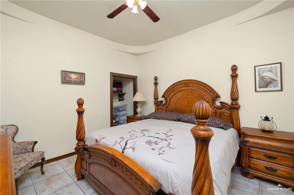 4523 South Tower Road Edinburg, TX 78542 - Photo 24 of 34 a bedroom with bed and balcony