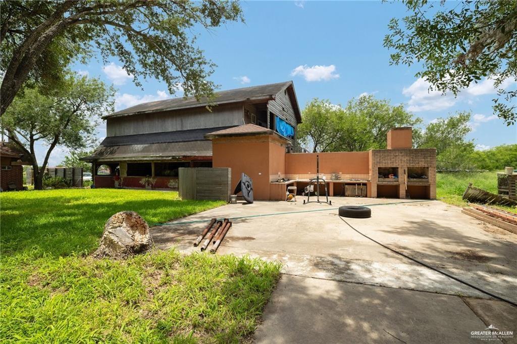 4523 South Tower Road Edinburg, TX 78542 - Photo 29 of 34 a view of a house with backyard and porch