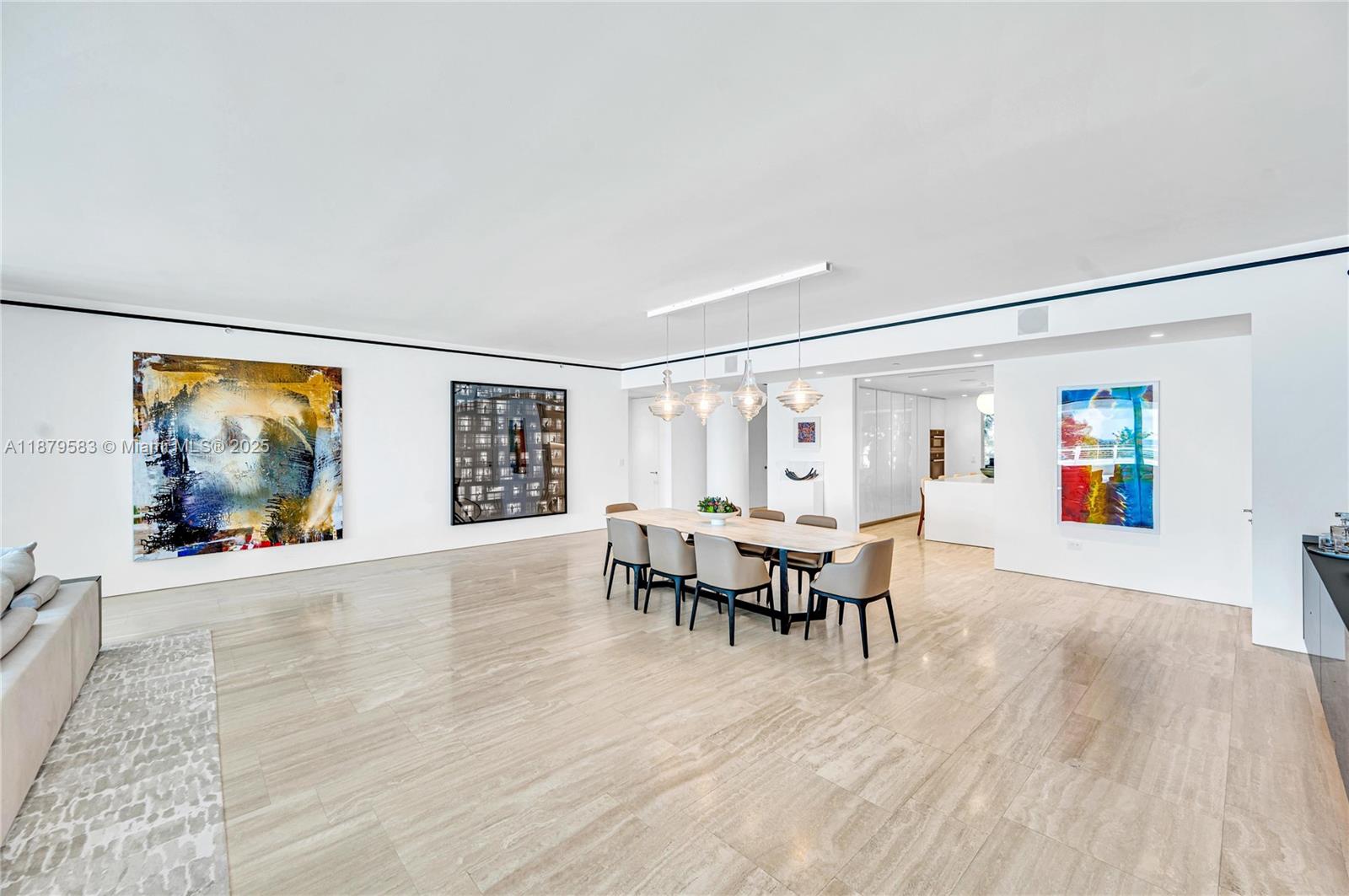 9001 Collins Avenue, Unit S201 Surfside, FL 33154 - Photo 14 of 44 a view of a livingroom with furniture and wooden floor