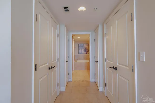 a view of a hallway with a shower