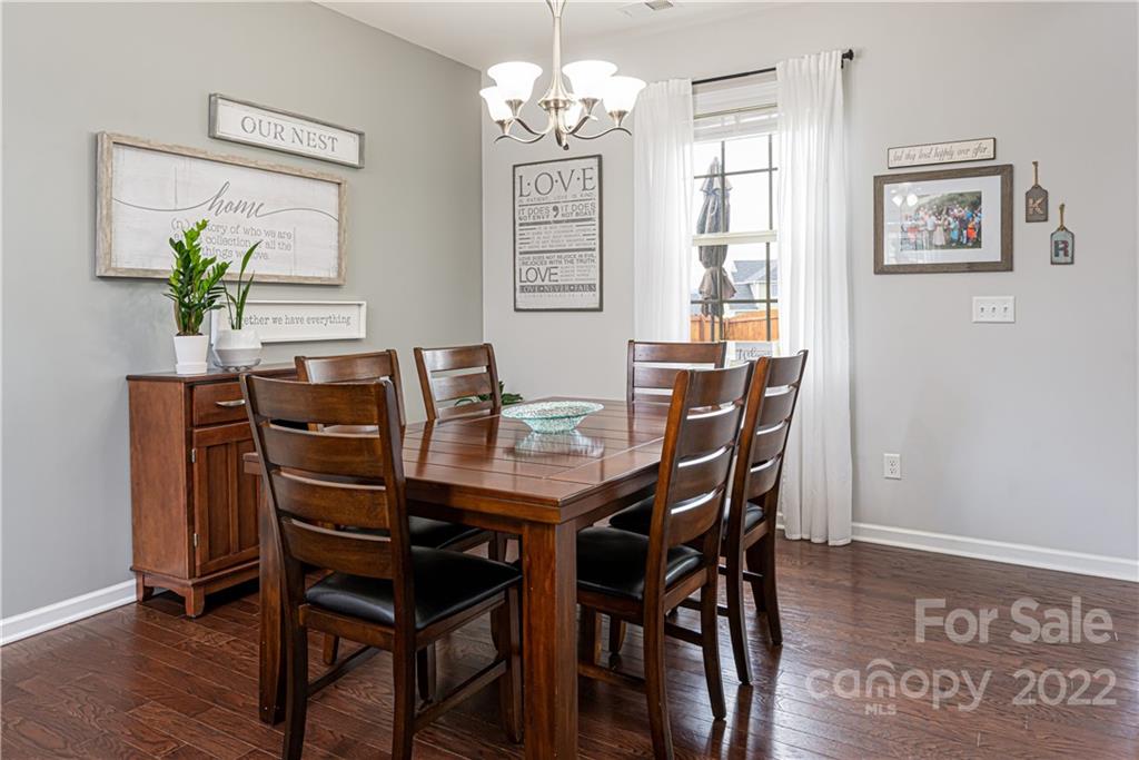 105 North River Road Fletcher, NC 28732 - Photo 14 of 43 a view of a dining room with furniture and chandelier
