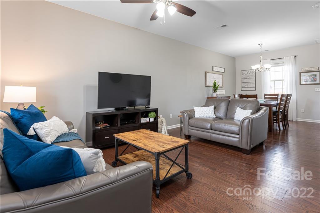 105 North River Road Fletcher, NC 28732 - Photo 6 of 43 a living room with furniture and a flat screen tv