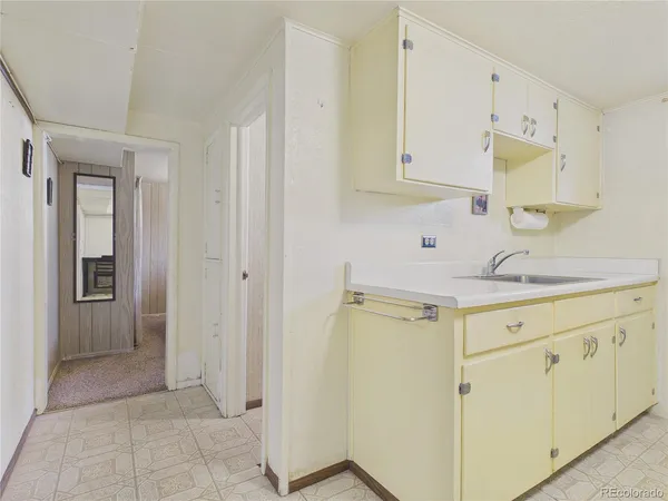 a view of center island cabinets and window