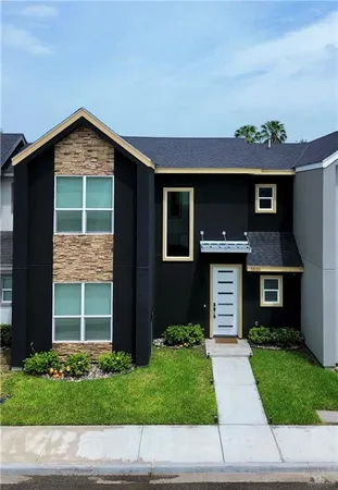 a house view with a garden space