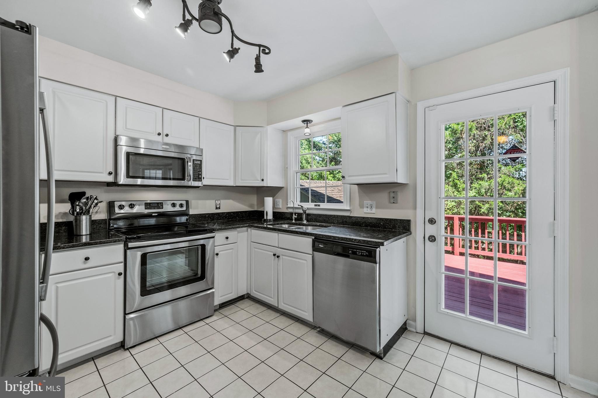 4751 Ten Oaks Road Dayton, MD 21036 - Photo 15 of 49 Kitchen opens to deck
