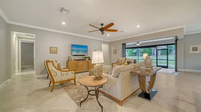 a view of a livingroom with furniture and a table