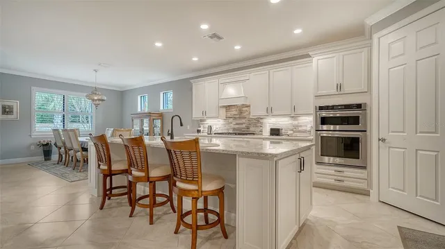 a kitchen with counter top space cabinets and stainless steel appliances