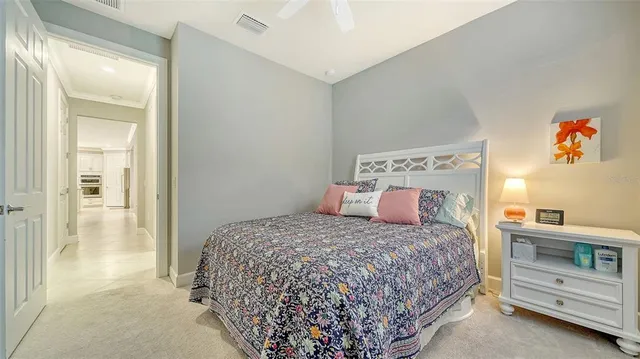 a bedroom with a bed and a cabinets