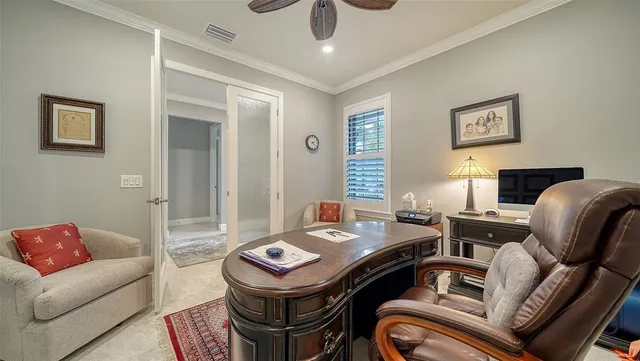 a bedroom with furniture and a chandelier