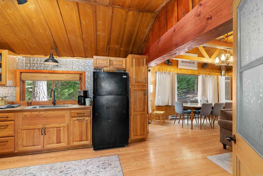 22194 Crestline Road Palomar Mountain, CA 92060 - Photo 13 of 75 The updated, big country kitchen is open to the living and dining area now.