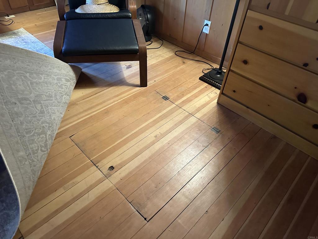 22194 Crestline Road Palomar Mountain, CA 92060 - Photo 22 of 75 There is a trap door to access a ladder to the walk-out basement.