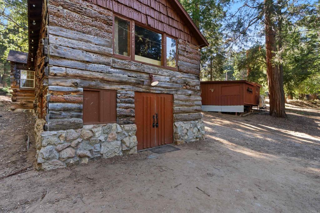 22194 Crestline Road Palomar Mountain, CA 92060 - Photo 25 of 75 a view of a house with a tree