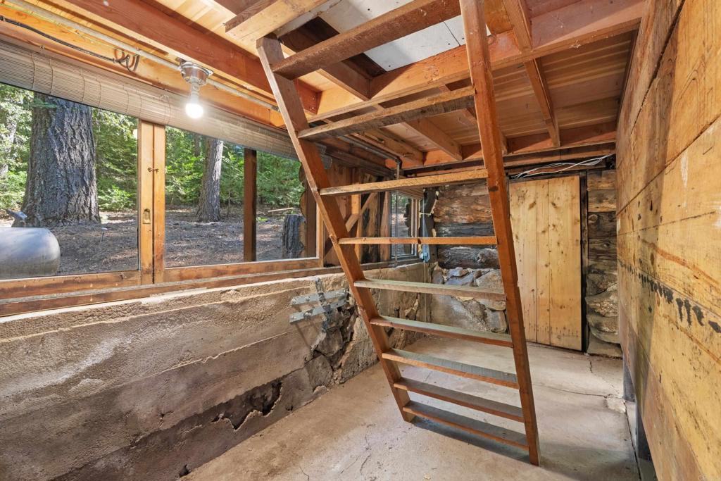 22194 Crestline Road Palomar Mountain, CA 92060 - Photo 28 of 75 a view of walk in closet with empty racks