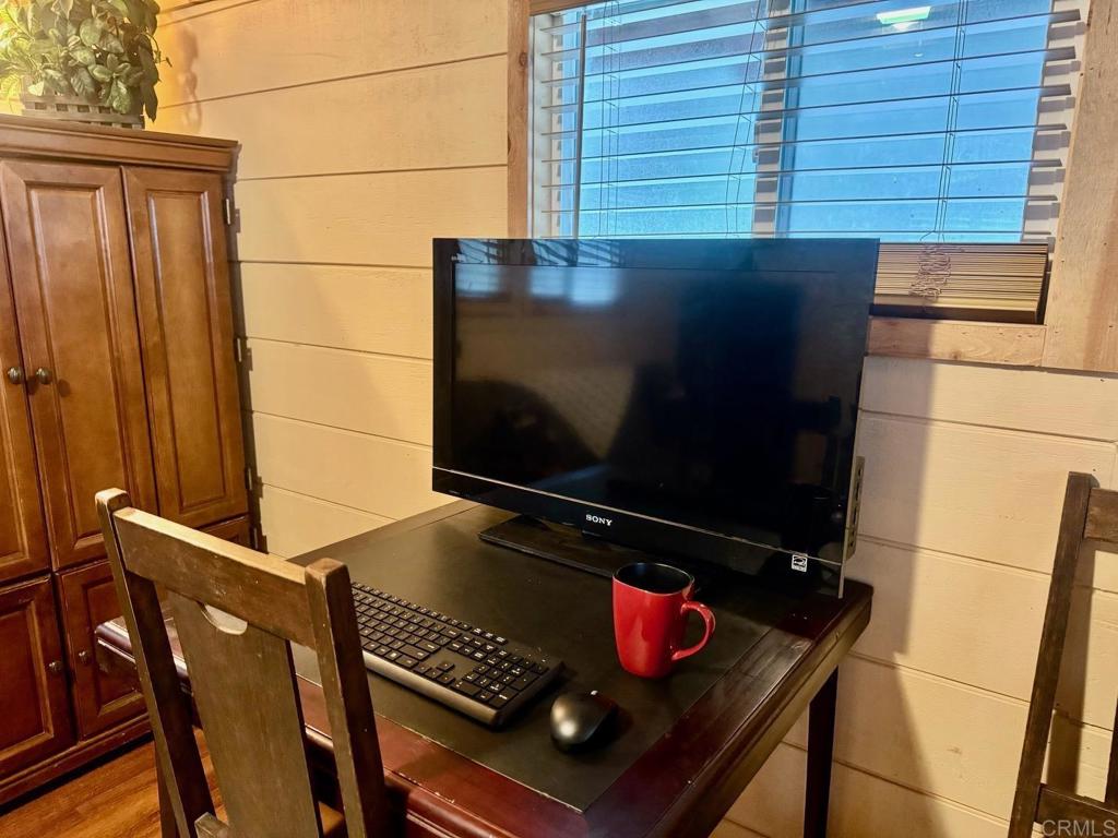 22194 Crestline Road Palomar Mountain, CA 92060 - Photo 54 of 75 a laptop computer sitting on top of a wooden floor