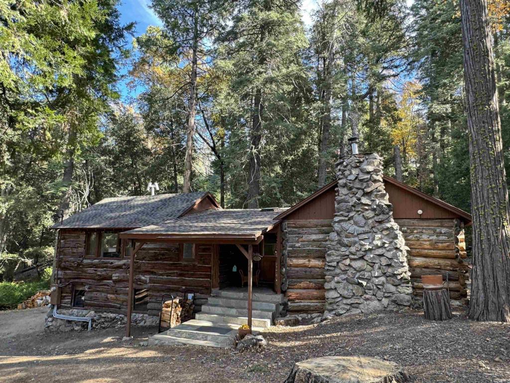 22194 Crestline Road Palomar Mountain, CA 92060 - Photo 74 of 75 a front view of a house with garden
