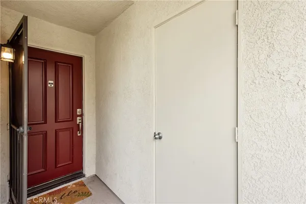 a view of a hallway with closet