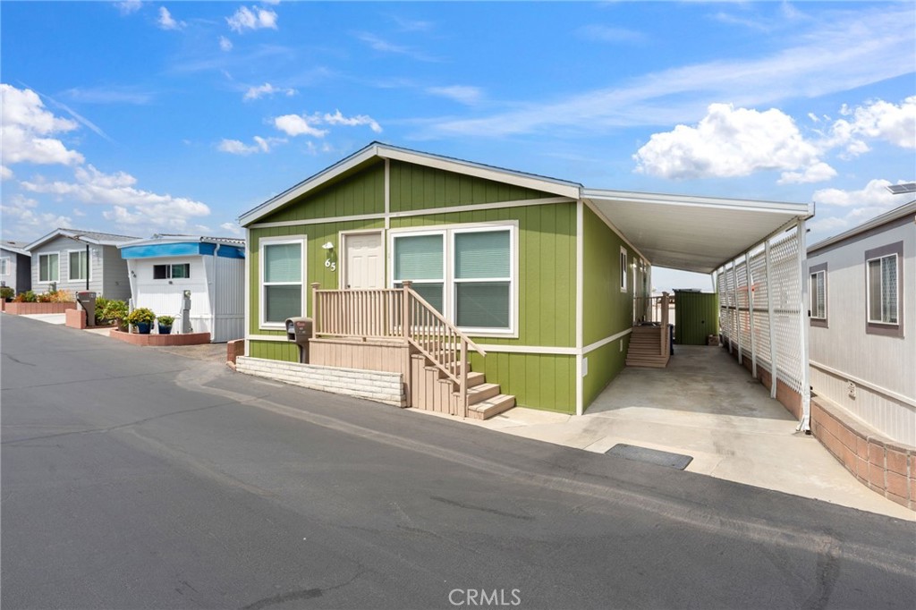 a house with trees in the background
