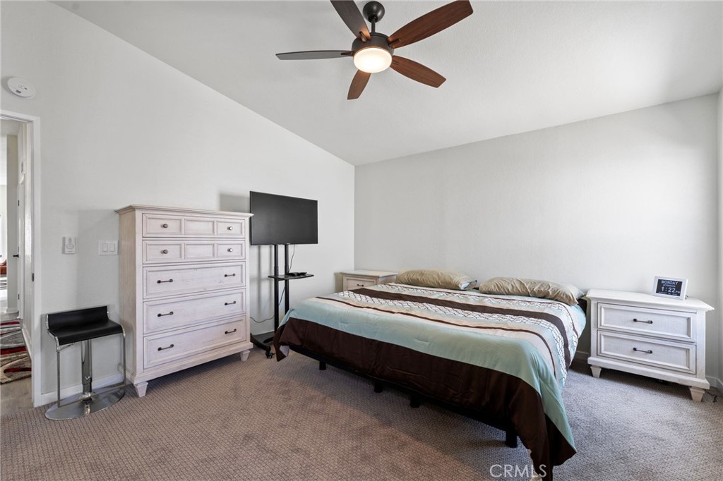 65 Hummingbird Lane Oceanside, CA 92057 - Photo 19 of 38 a bedroom with a bed and a closet