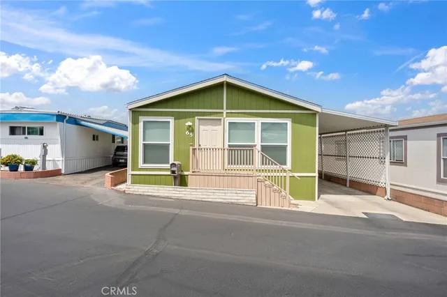a house view with a garden space