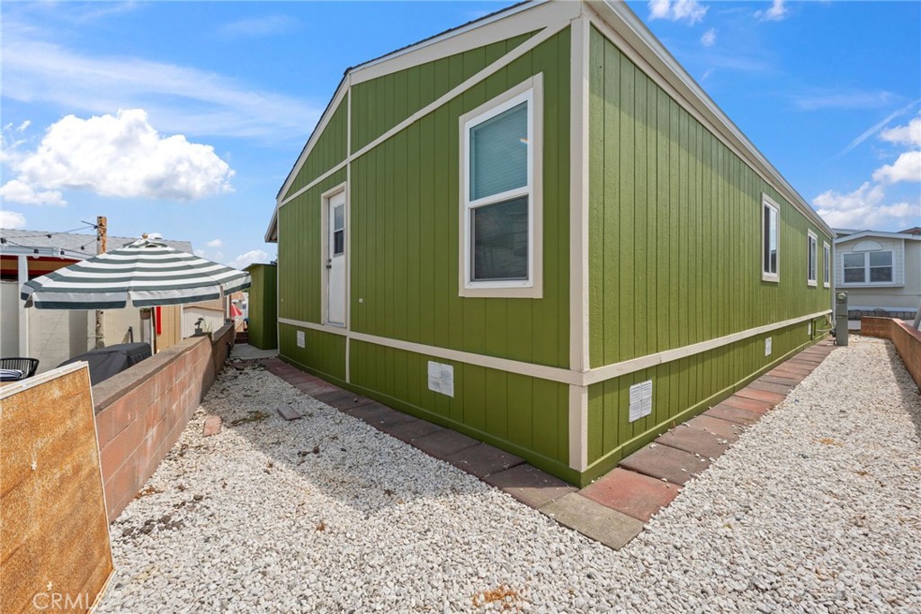 65 Hummingbird Lane Oceanside, CA 92057 - Photo 30 of 38 a view of a house with a yard
