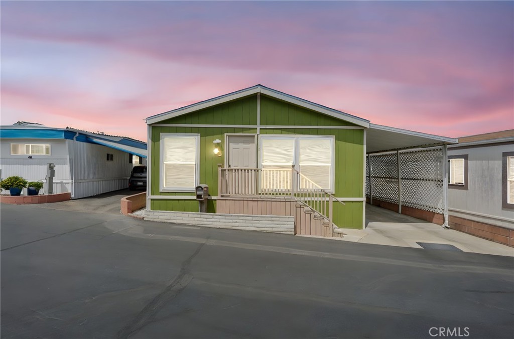 65 Hummingbird Lane Oceanside, CA 92057 - Photo 3 of 38 a view of backyard of a house