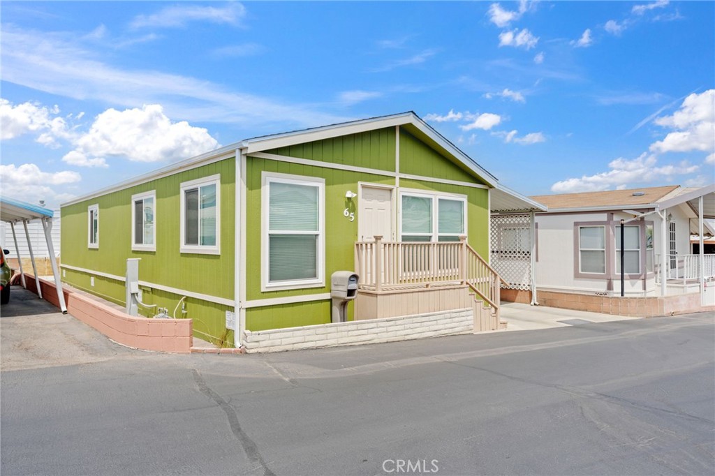 65 Hummingbird Lane Oceanside, CA 92057 - Photo 4 of 38 a view of a house with a outdoor space