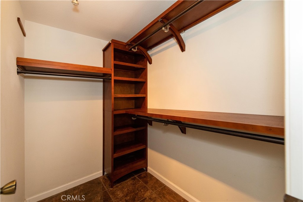 39203 Laurel Leaf Drive Murrieta, CA 92563 - Photo 27 of 59 a view of walk in closet with clothes and shoes