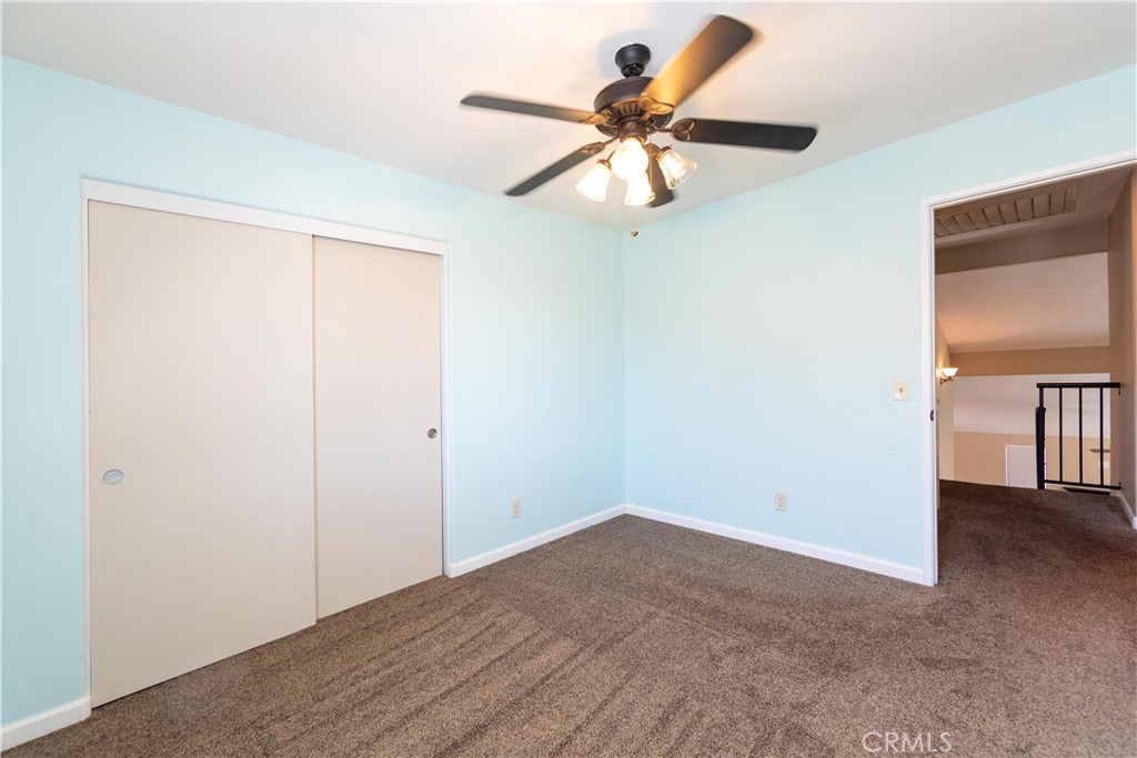 39203 Laurel Leaf Drive Murrieta, CA 92563 - Photo 30 of 59 a view of a room with a ceiling fan
