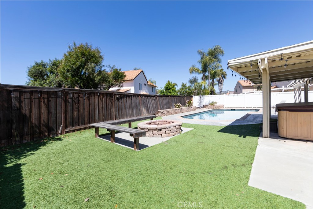 39203 Laurel Leaf Drive Murrieta, CA 92563 - Photo 42 of 59 a view of a backyard with sitting area
