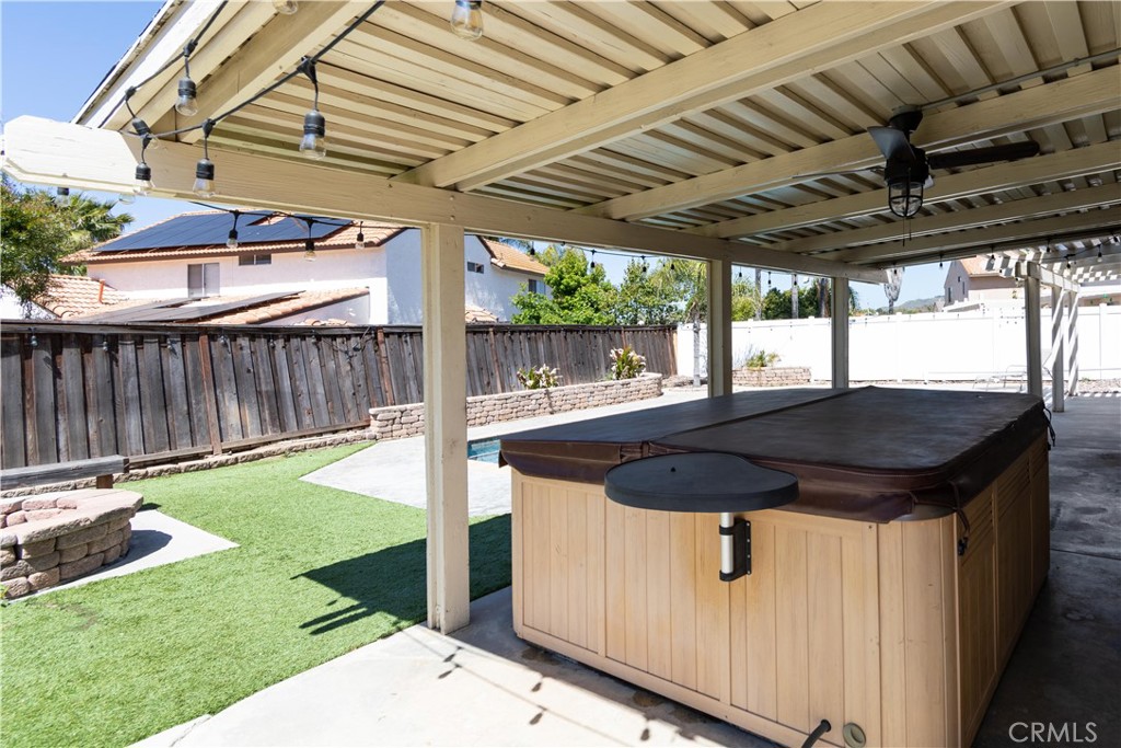 39203 Laurel Leaf Drive Murrieta, CA 92563 - Photo 43 of 59 a view of a backyard with a sink and wooden fence