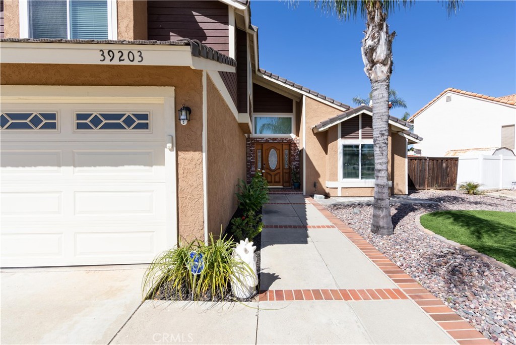 39203 Laurel Leaf Drive Murrieta, CA 92563 - Photo 48 of 59 a sign board on the side of a building
