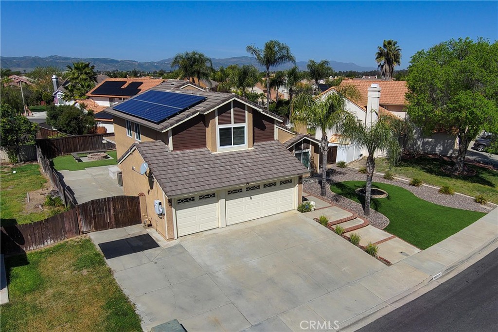 39203 Laurel Leaf Drive Murrieta, CA 92563 - Photo 50 of 59 a aerial view of a house with a yard and potted plants